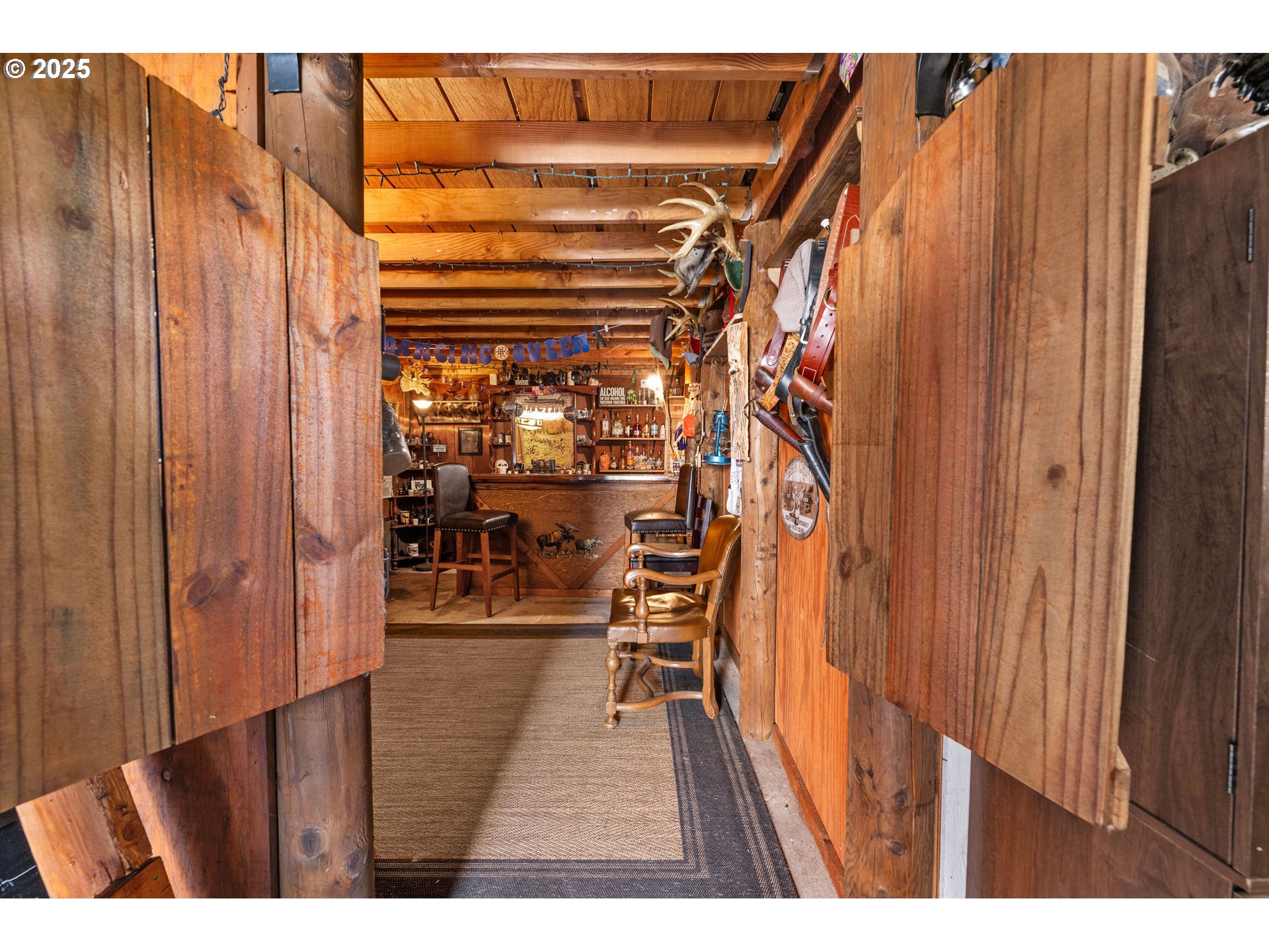 1390 Swedetown Road Clatskanie, OR 97016 - Photo 34 of 42 a view of a room with wooden floor and stairs