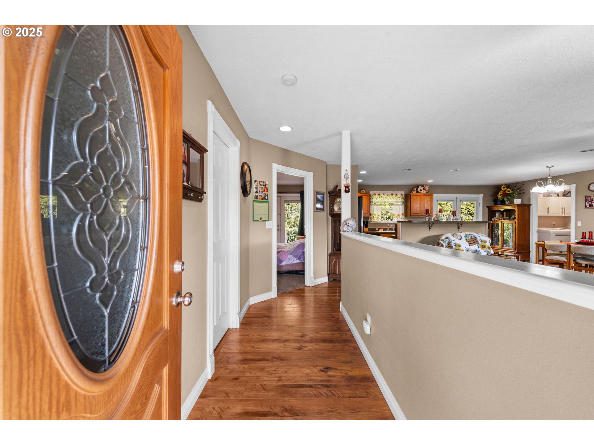 1390 Swedetown Road Clatskanie, OR 97016 - Photo 6 of 42 a view of a hallway with wooden floor