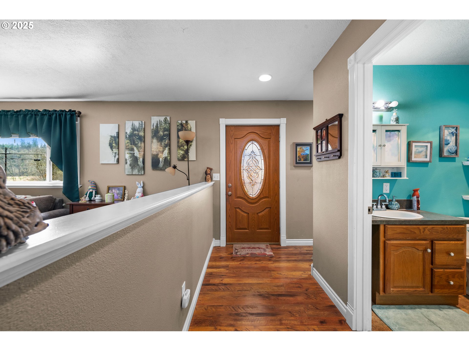 1390 Swedetown Road Clatskanie, OR 97016 - Photo 7 of 42 a living room with furniture and a flat screen tv