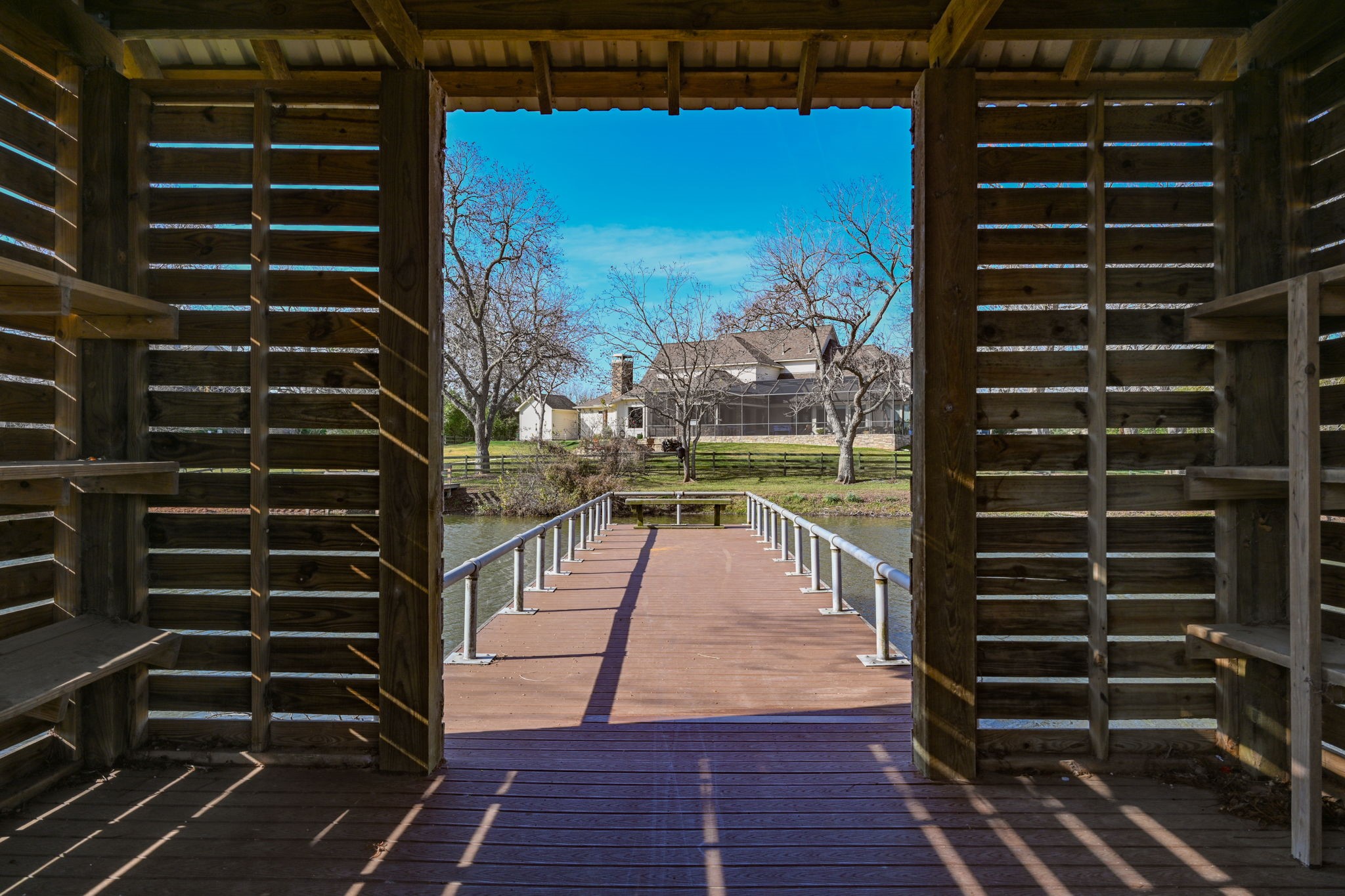 31119 Riverlake Road Fulshear, TX 77441 - Photo 13 of 27 Fishing docks in the neighborhood and a fully stocked lake for fishing and boating.