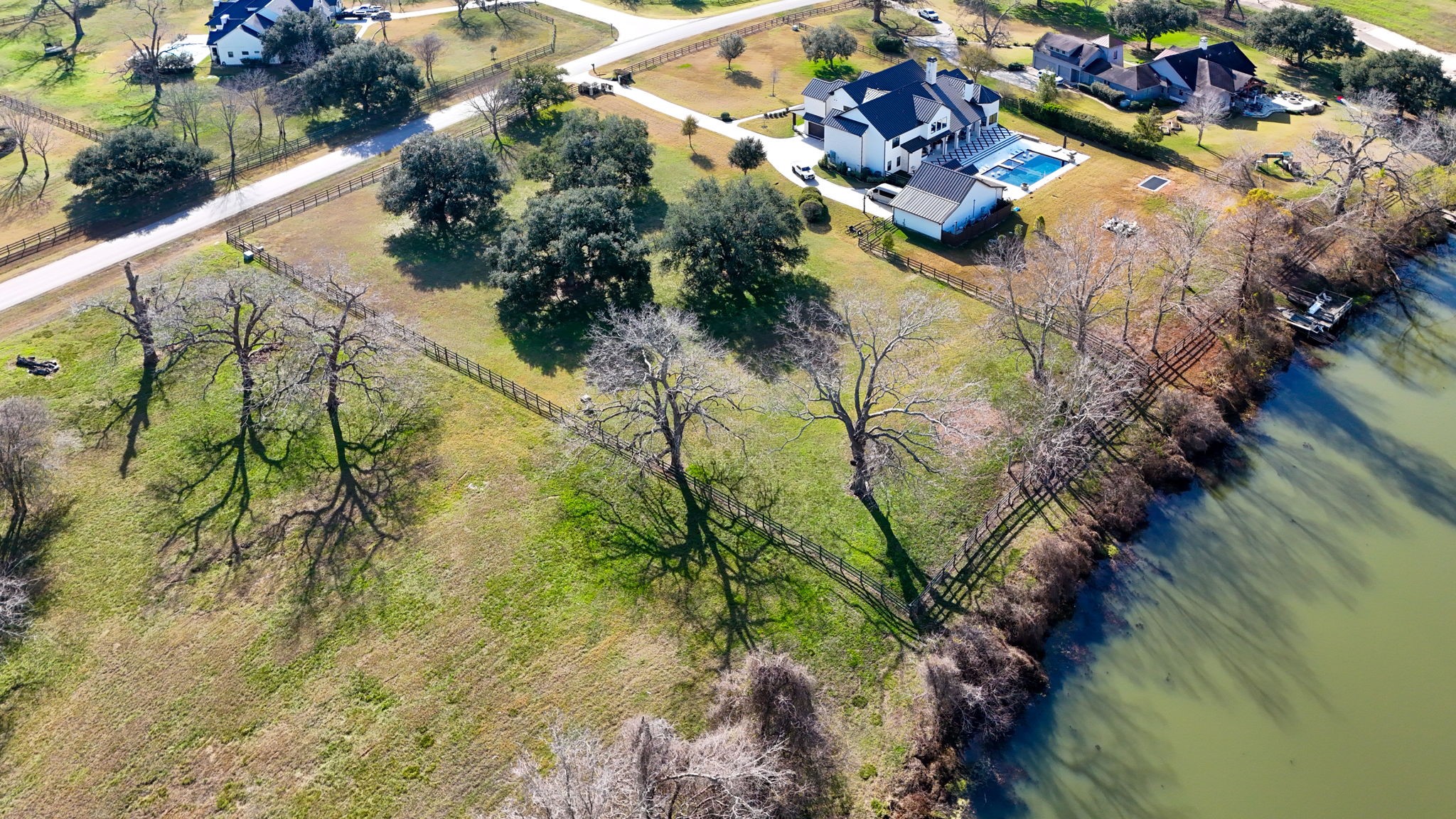 31119 Riverlake Road Fulshear, TX 77441 - Photo 4 of 27 Beautiful live oaks and pecan trees dot the landscape of the Oxbow.