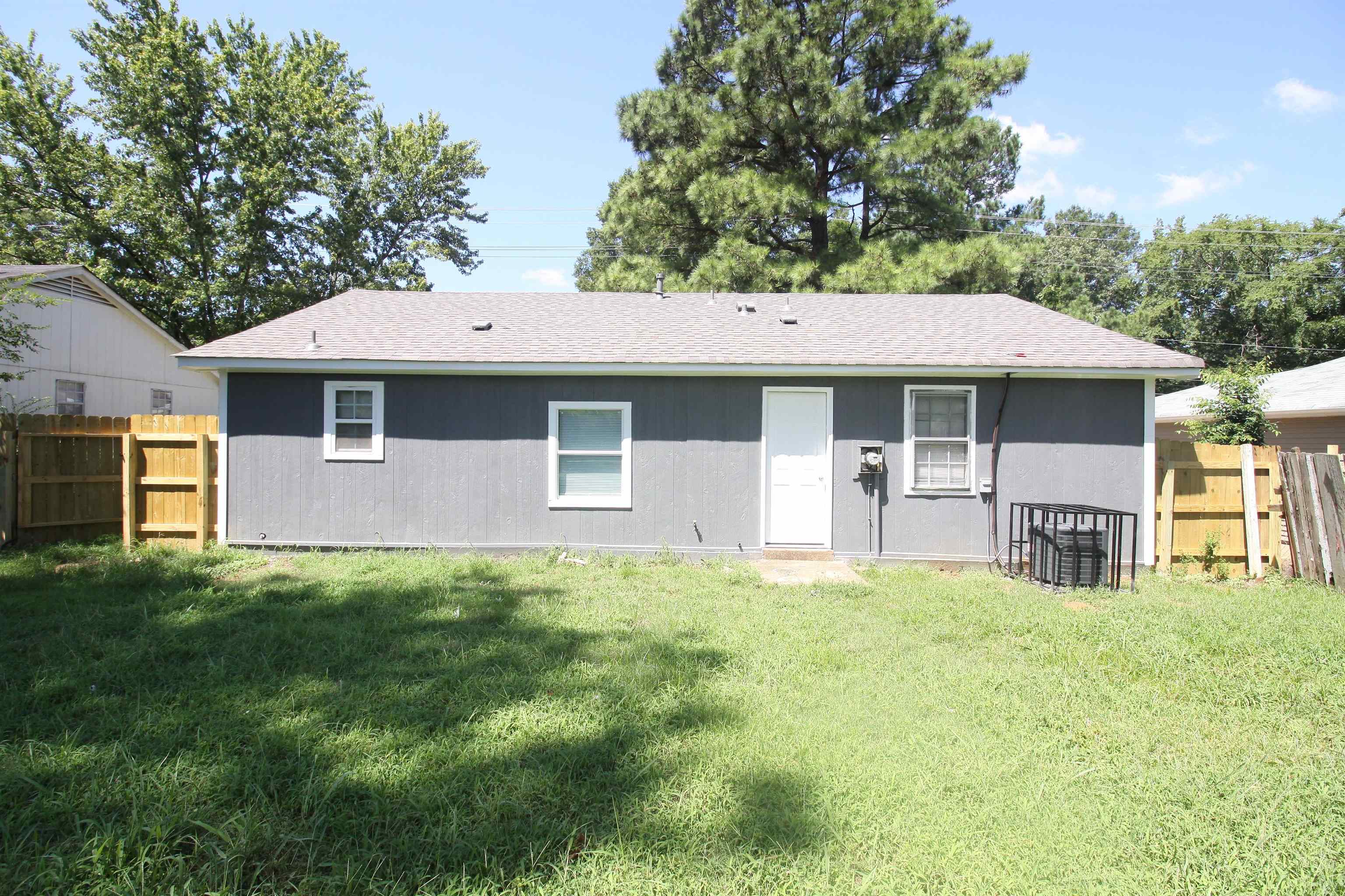 4780 Hillbrook Road Memphis, TN 38109 - Photo 14 of 14 a house that has tree in front of it