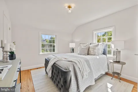 a bed room with a bed and a couch