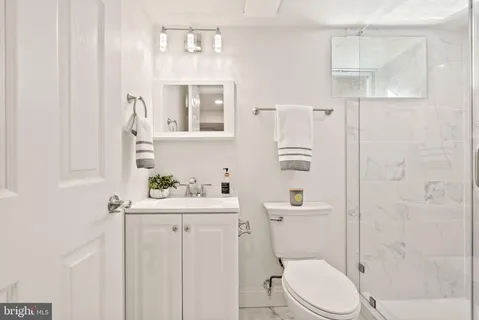 a view of backyard with outdoor seating and green space