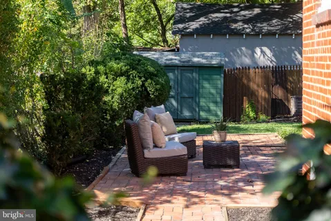 a view of a backyard with a garden