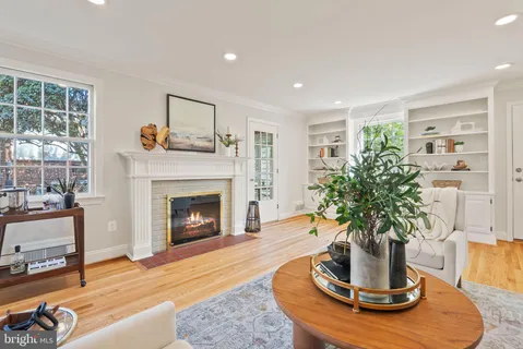 a kitchen with stainless steel appliances a sink a stove and a microwave
