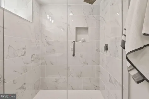 a backyard of a house with yard and trampoline