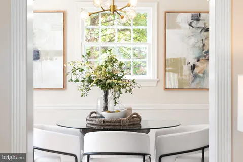 a vase of flowers sitting on a table