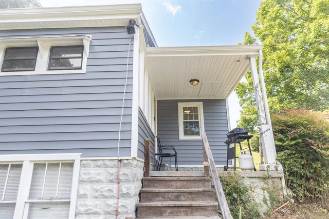a front view of a house with a window