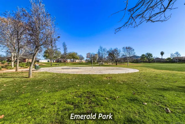a view of a swimming pool with an outdoor space and seating area