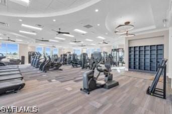 43981 Boardwalk Loop, Unit 2232 Punta Gorda, FL 33982 - Photo 21 of 34 Gym featuring an inviting chandelier and wood-type flooring