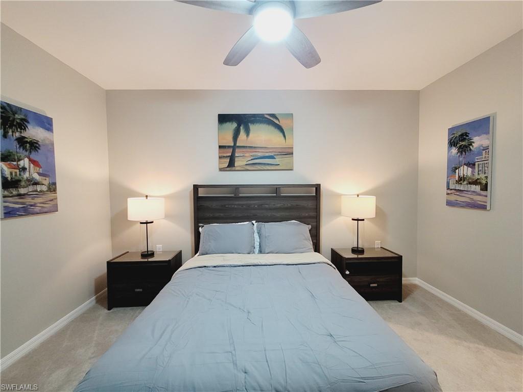 43981 Boardwalk Loop, Unit 2232 Punta Gorda, FL 33982 - Photo 34 of 34 Bedroom featuring ceiling fan and light colored carpet