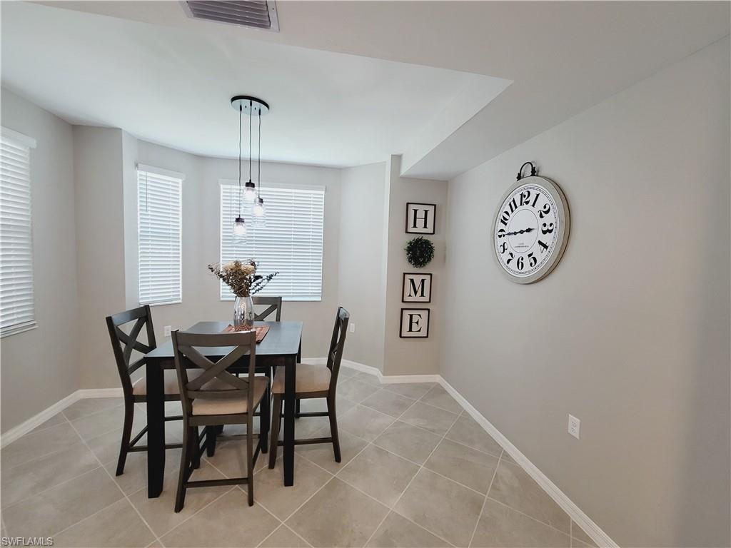 43981 Boardwalk Loop, Unit 2232 Punta Gorda, FL 33982 - Photo 7 of 34 Dining area featuring light tile patterned floors