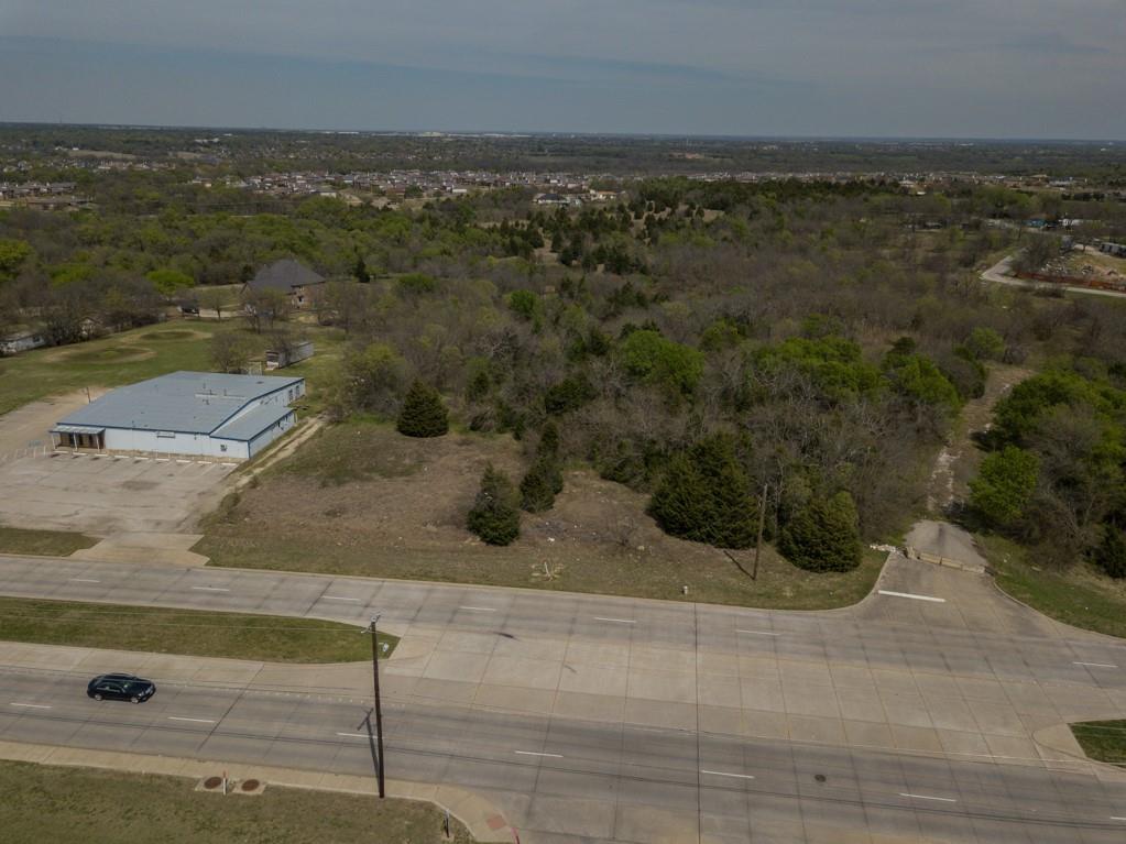 3495 South Beltline Road Balch Springs, TX 75181 - Photo 3 of 12 an aerial view of residential houses with outdoor space