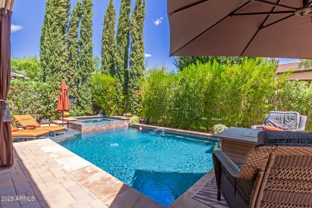 swimming pool with outdoor seating