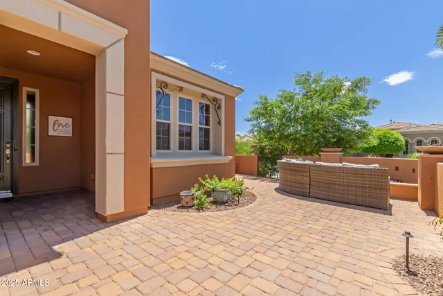 a outdoor space with lots of potted plants