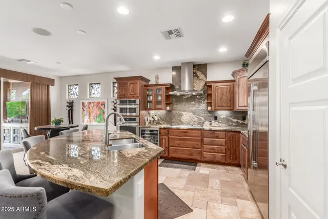 a kitchen with kitchen island granite countertop lots of counter top space