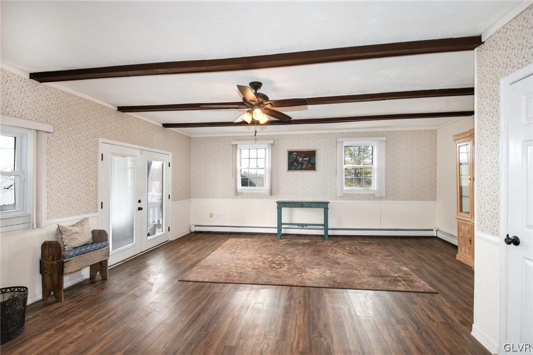 4384 Lehnenberg Road Riegelsville, PA 18077 - Photo 18 of 36 a view of empty room with wooden floor and fan
