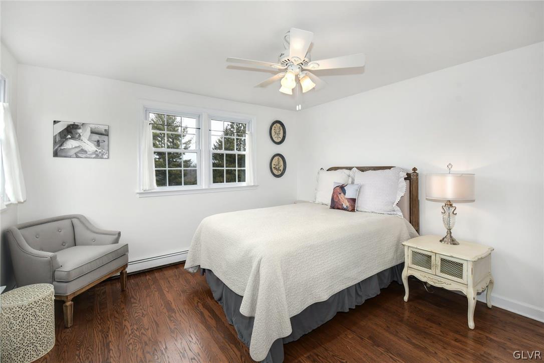 4384 Lehnenberg Road Riegelsville, PA 18077 - Photo 24 of 36 a bedroom with a bed and a couch