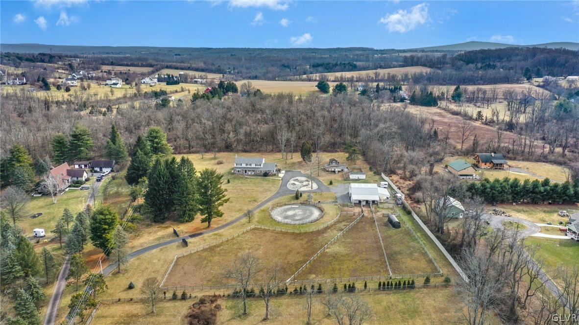 4384 Lehnenberg Road Riegelsville, PA 18077 - Photo 36 of 36 a view of a swimming pool with a yard and mountain view