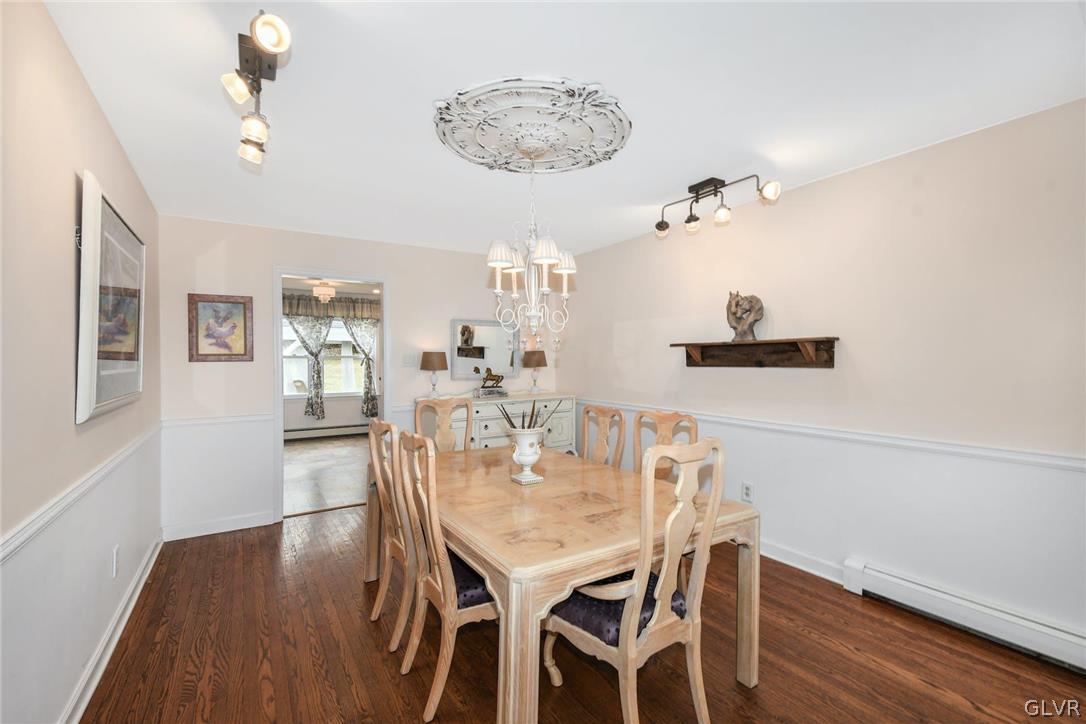 4384 Lehnenberg Road Riegelsville, PA 18077 - Photo 10 of 36 a view of a dining room with furniture and wooden floor