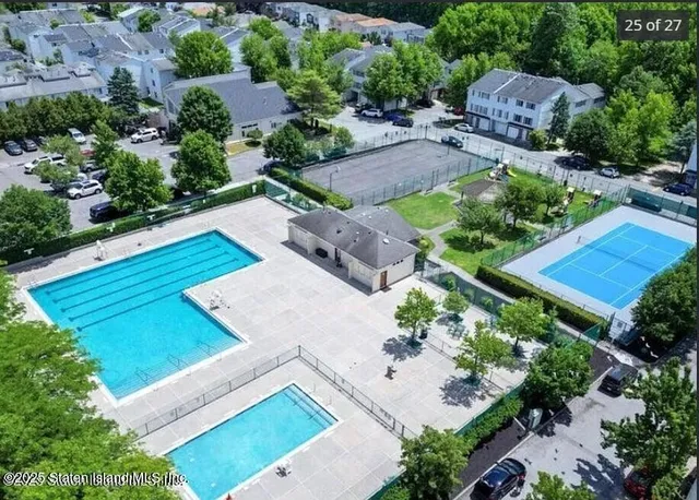 an aerial view of a house with a garden