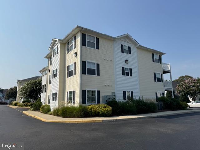 a front view of a white building