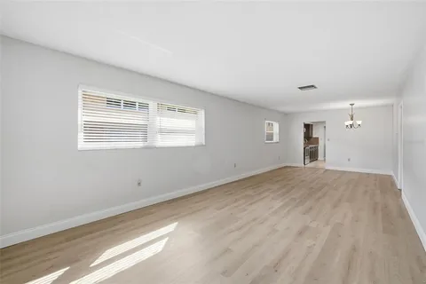 a view of a room that has a window in it