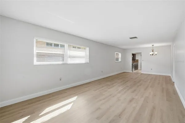 a view of a room that has a window in it