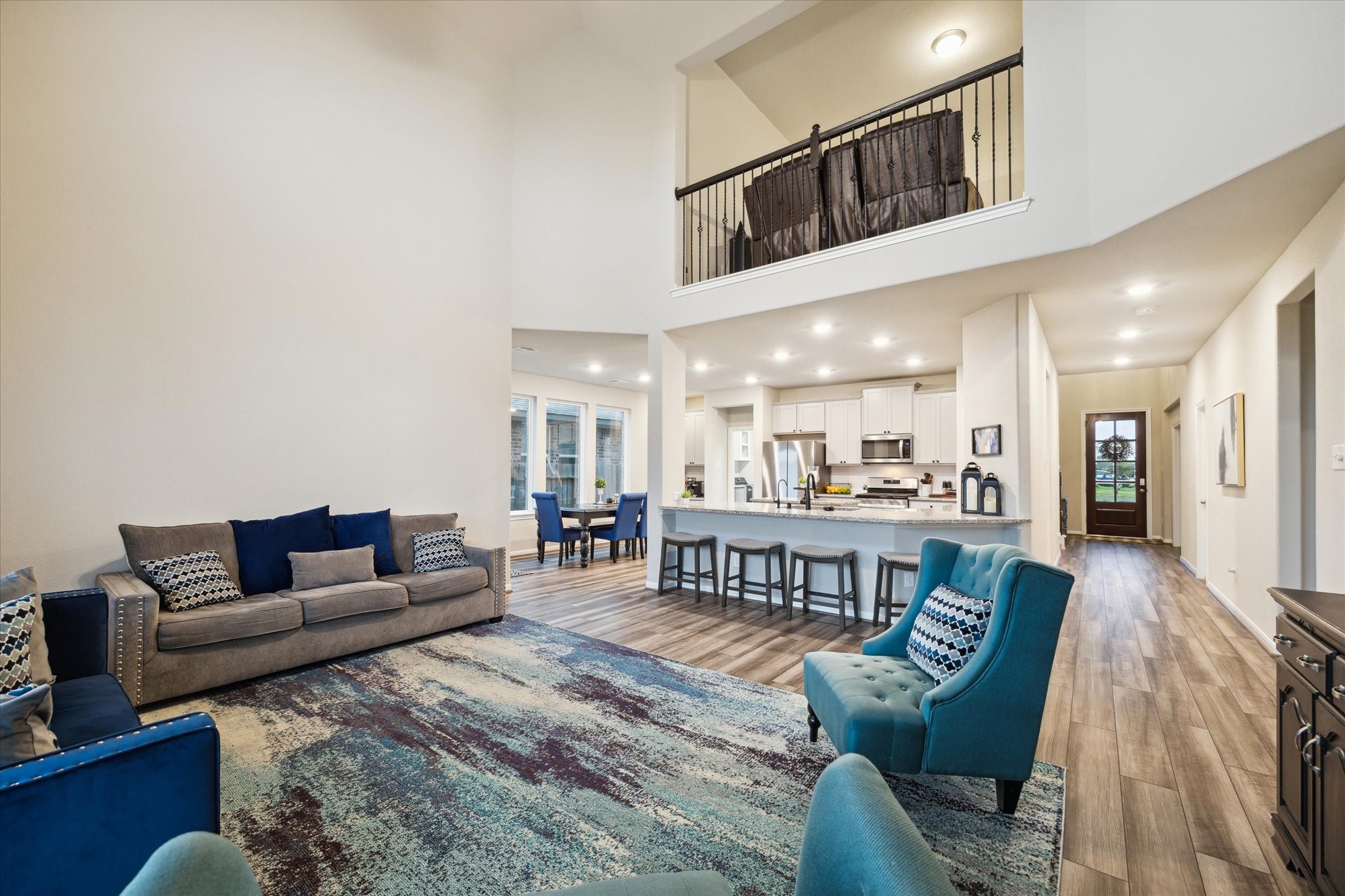 17218 Roxburgh Lake Lane Hockley, TX 77447 - Photo 14 of 36 a living room with furniture and a view of kitchen