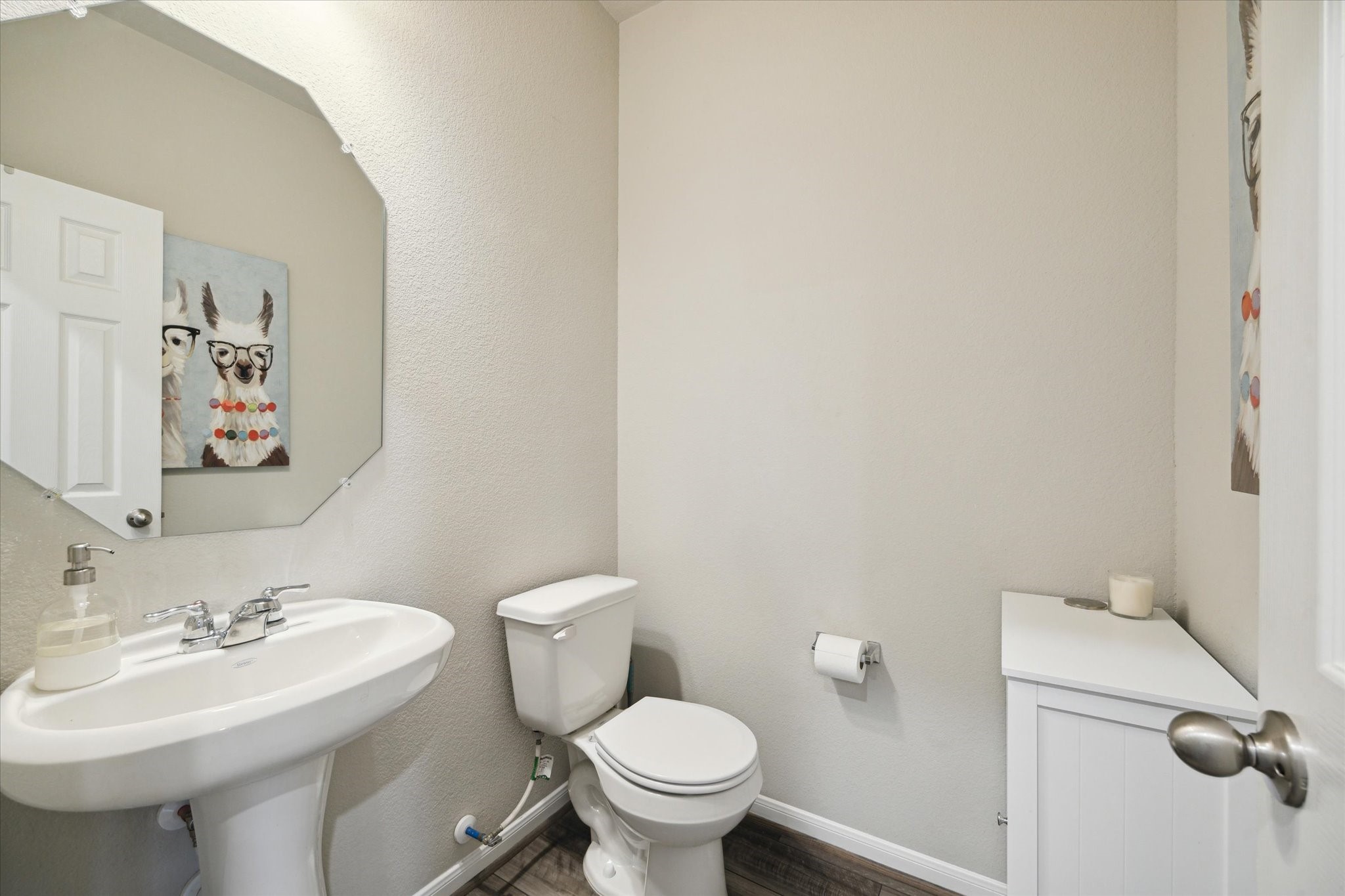 17218 Roxburgh Lake Lane Hockley, TX 77447 - Photo 15 of 36 a bathroom with a sink toilet and a mirror