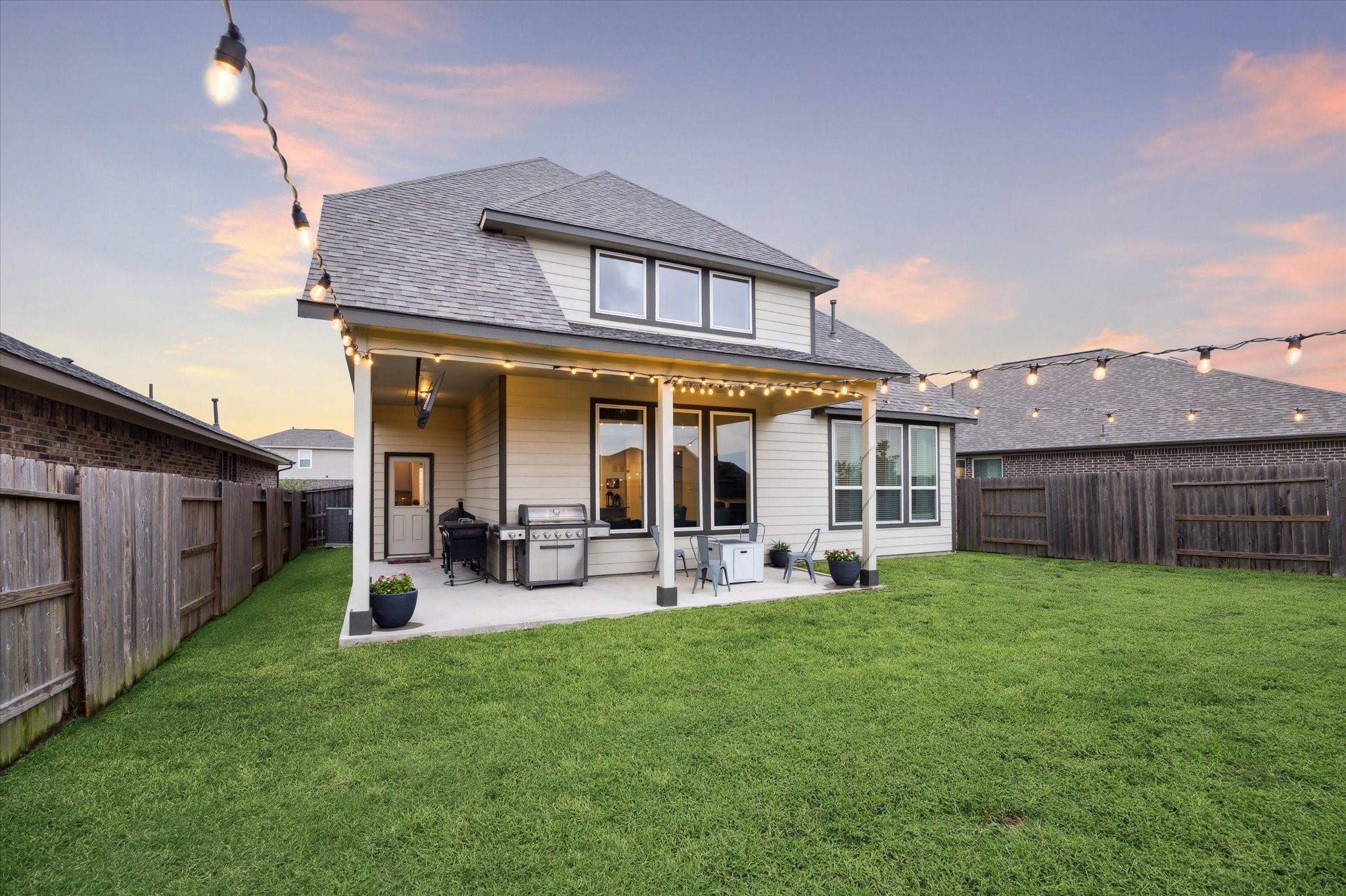 17218 Roxburgh Lake Lane Hockley, TX 77447 - Photo 31 of 36 a view of a house with a yard and sitting area