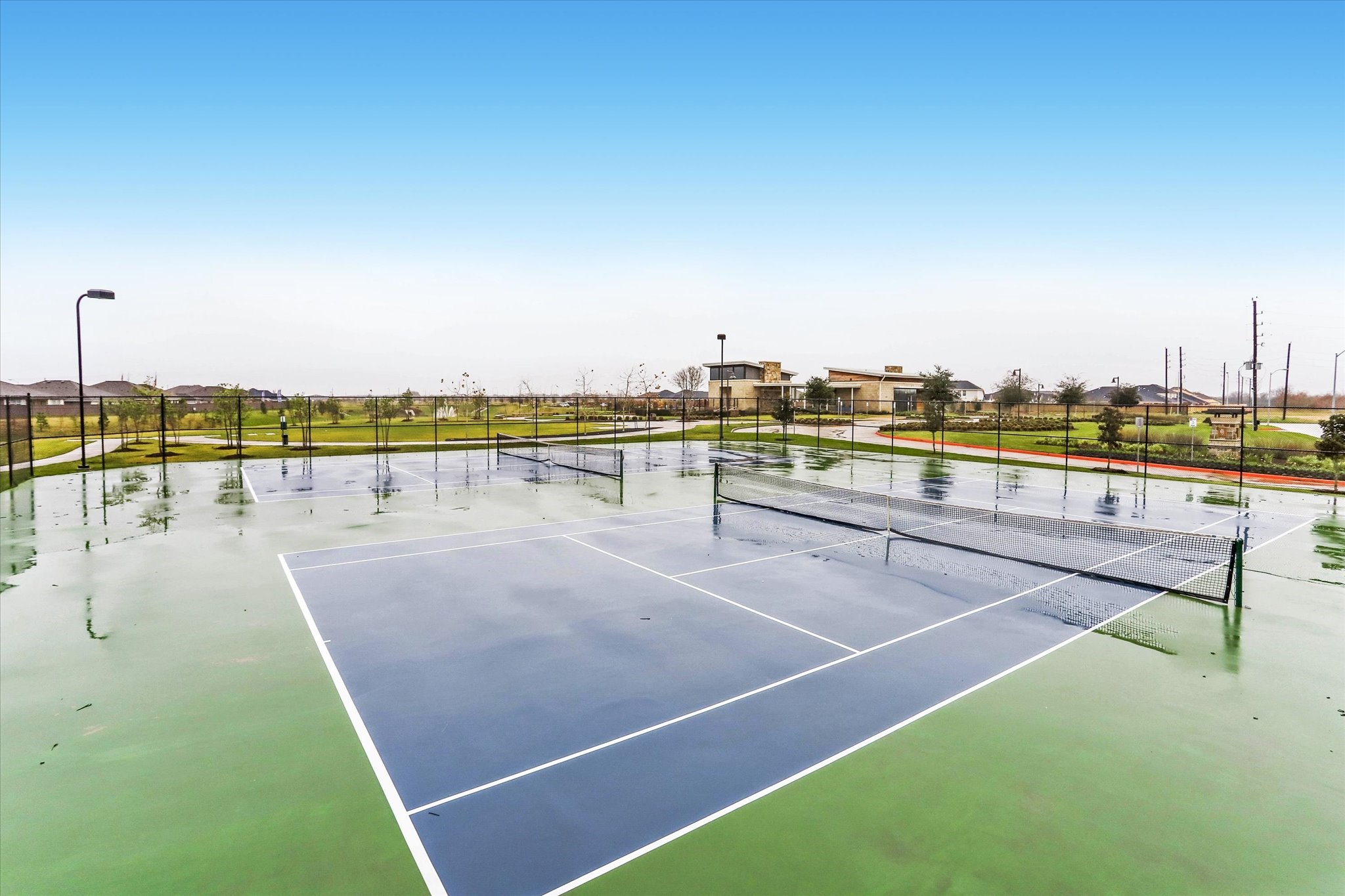 17218 Roxburgh Lake Lane Hockley, TX 77447 - Photo 33 of 36 a view of an outdoor space and tennis court