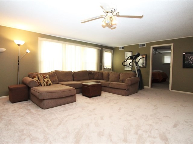 23 Crescent Road Lake Zurich, IL 60047 - Photo 8 of 18 a living room with furniture and a window