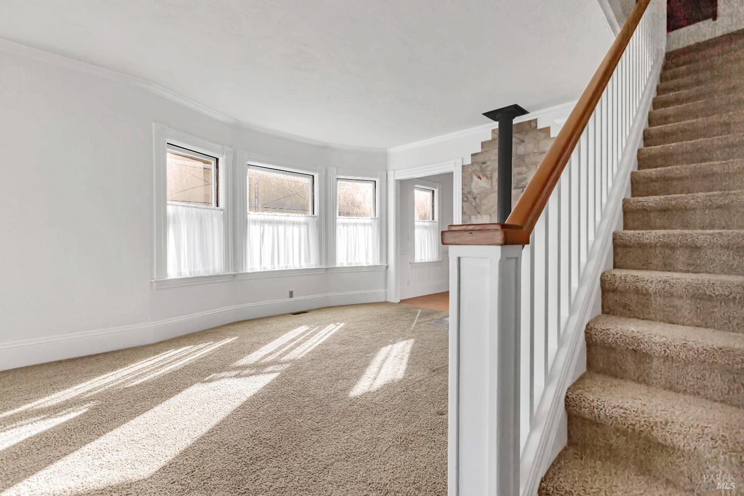 29 Frances Street San Rafael, CA 94901 - Photo 26 of 48 Stairs to the upper level with 2 additional bedrooms.