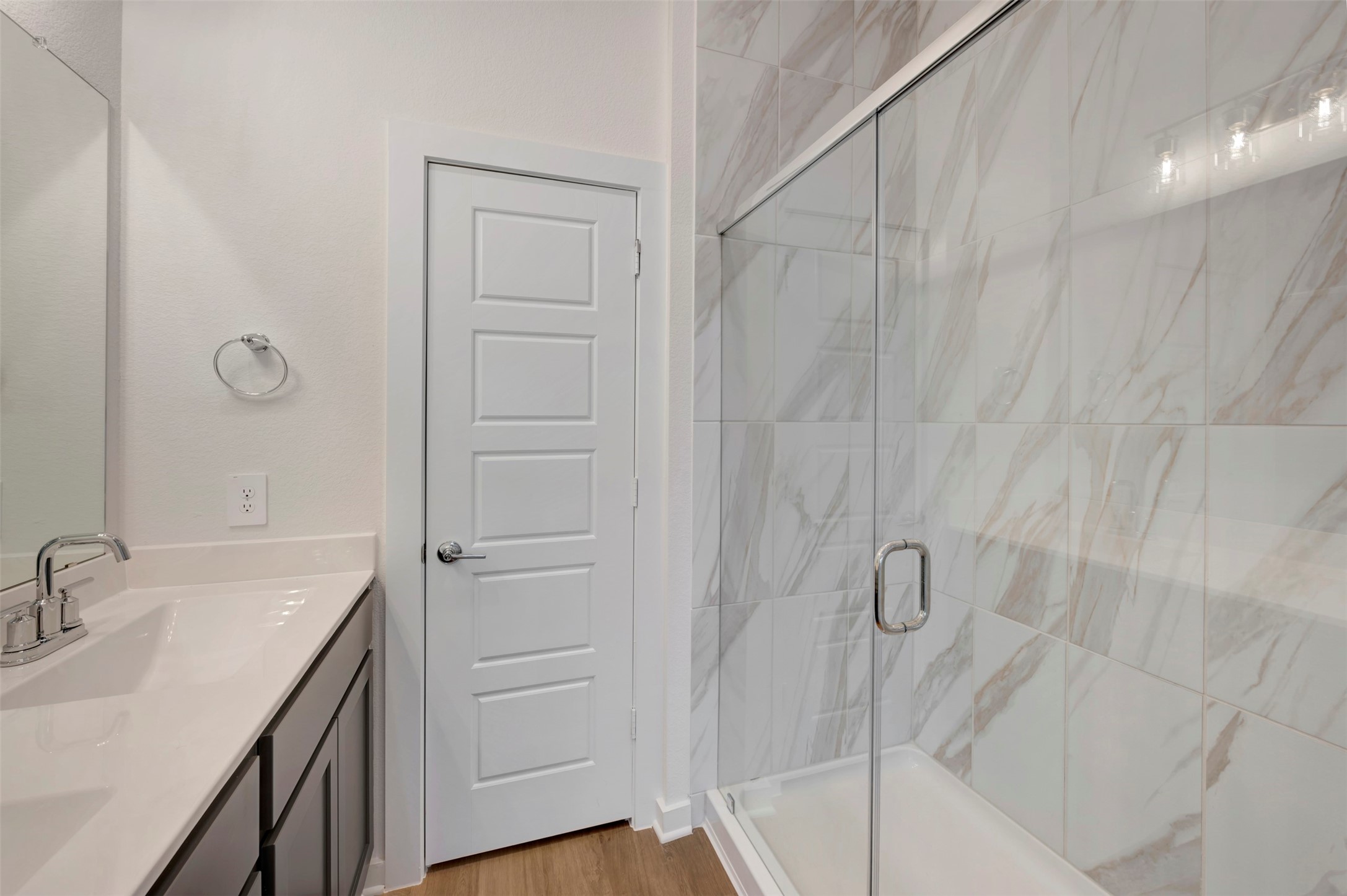 633 Falling Cave Drive Willis, TX 77378 - Photo 34 of 42 a bathroom with a sink and shower