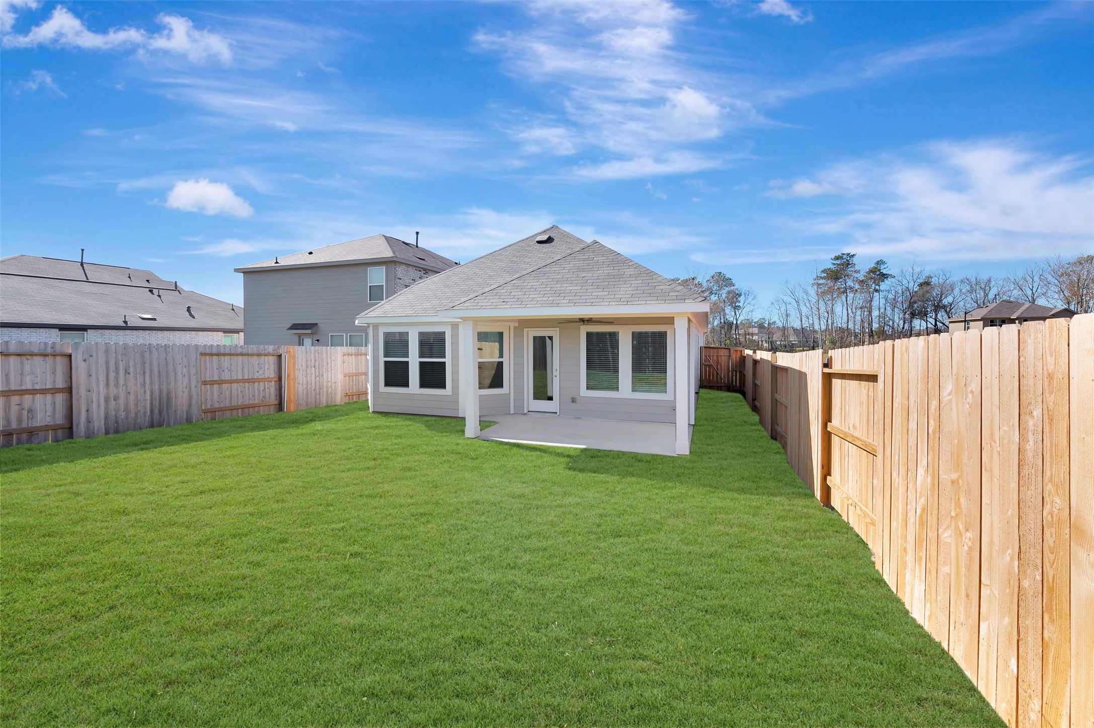 633 Falling Cave Drive Willis, TX 77378 - Photo 36 of 42 a front view of a house with a garden