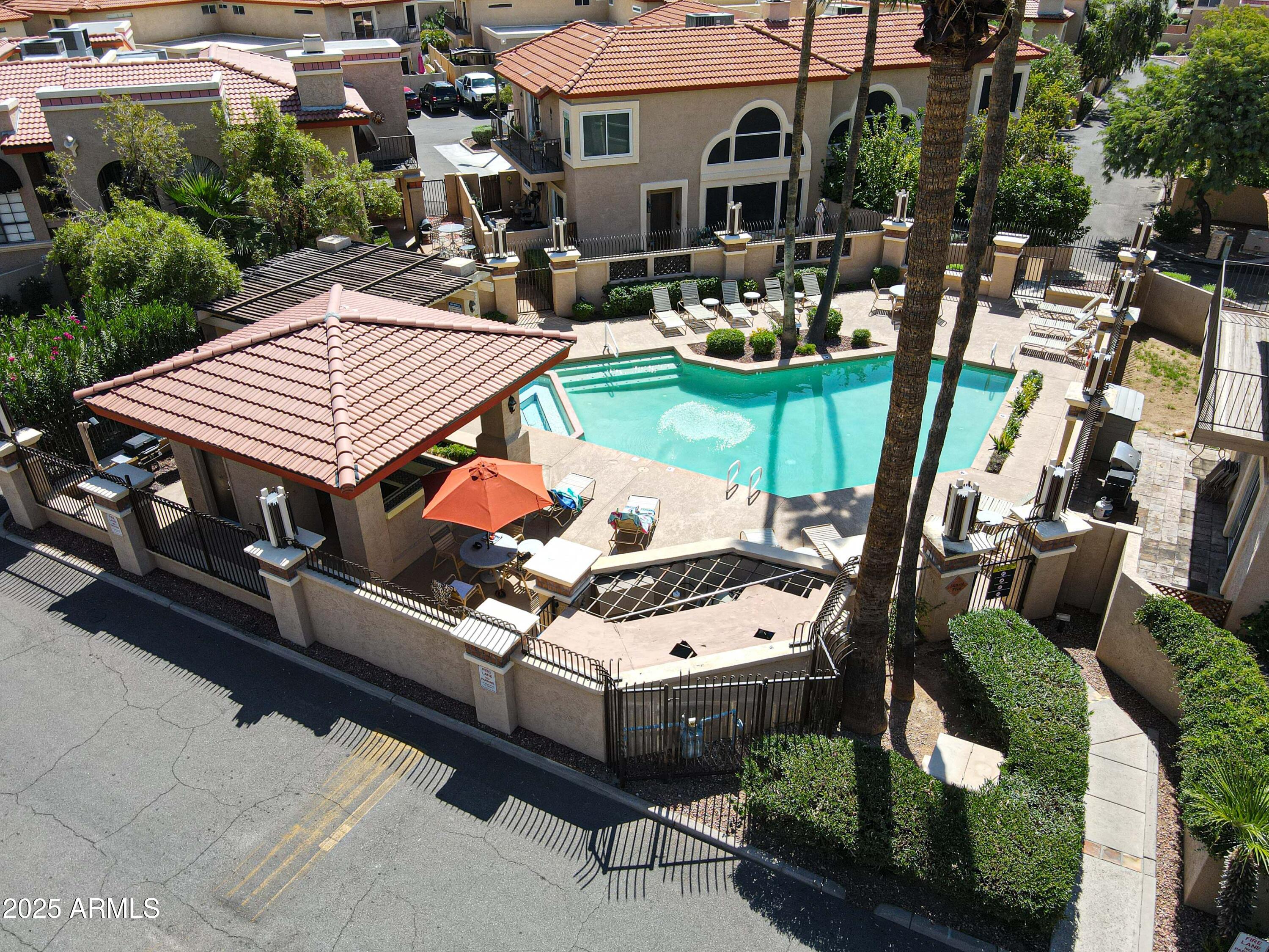 10410 North Cave Creek Road, Unit 2220 Phoenix, AZ 85020 - Photo 31 of 33 an aerial view of a house with backyard space and patio