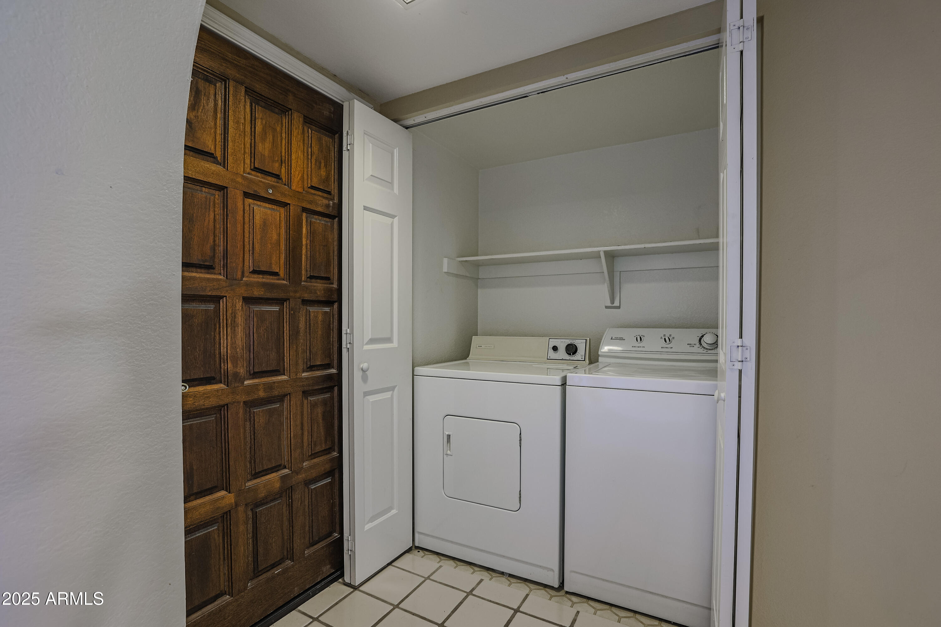 10410 North Cave Creek Road, Unit 2220 Phoenix, AZ 85020 - Photo 10 of 33 a utility room with dryer and washer