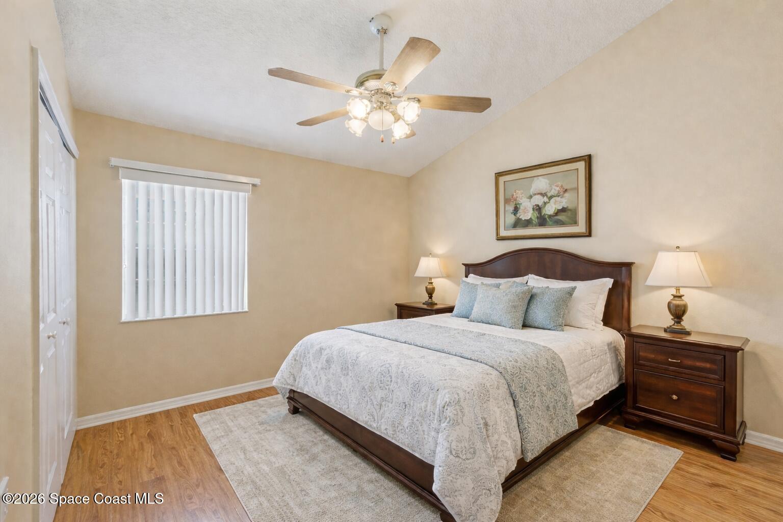 934 South Fork Circle Melbourne, FL 32901 - Photo 20 of 60 a bedroom with a bed and a painting on the wall