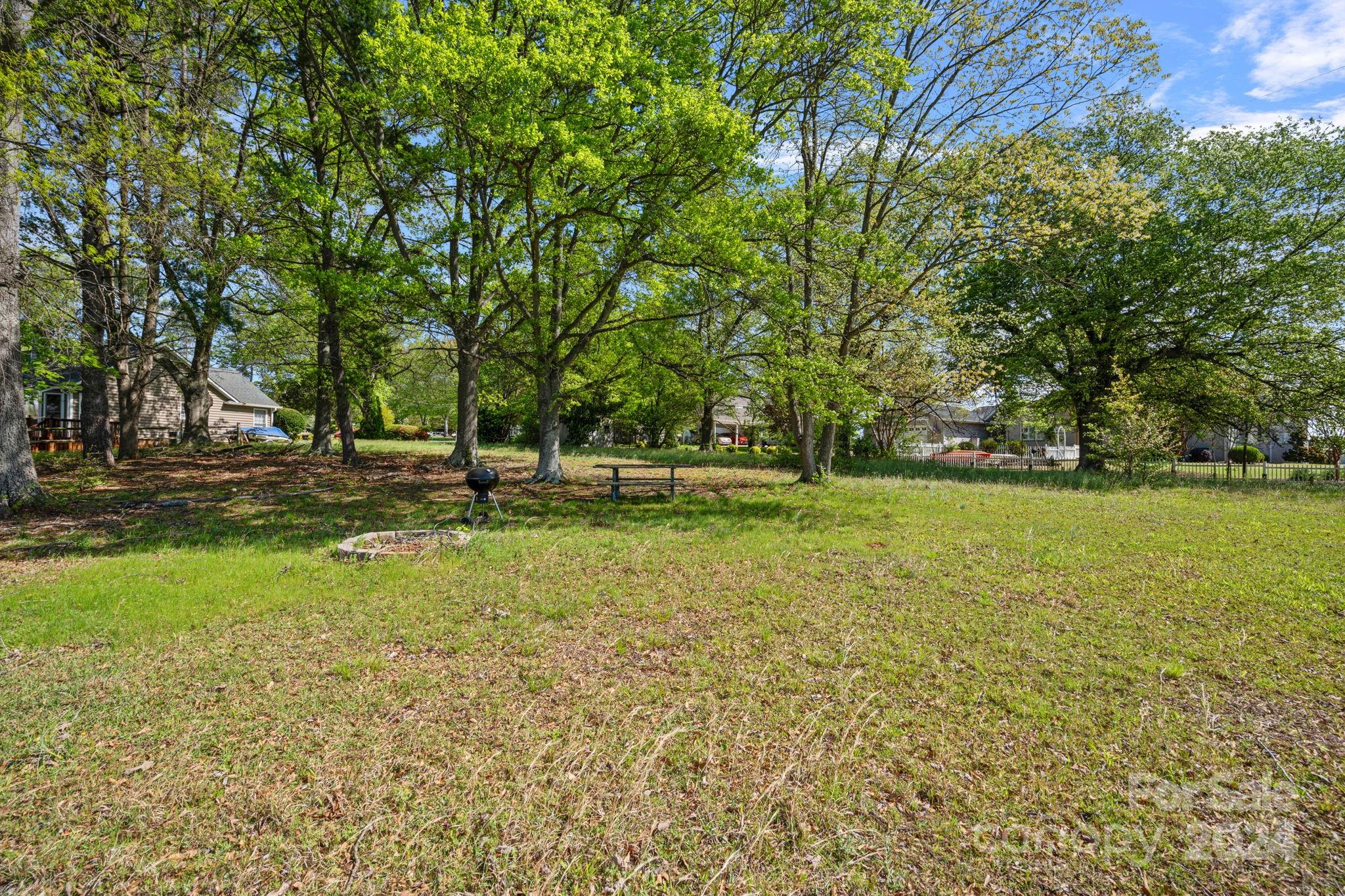 1 Primm Road Denver, NC 28037 - Photo 23 of 23 a view of outdoor space with deck and trees