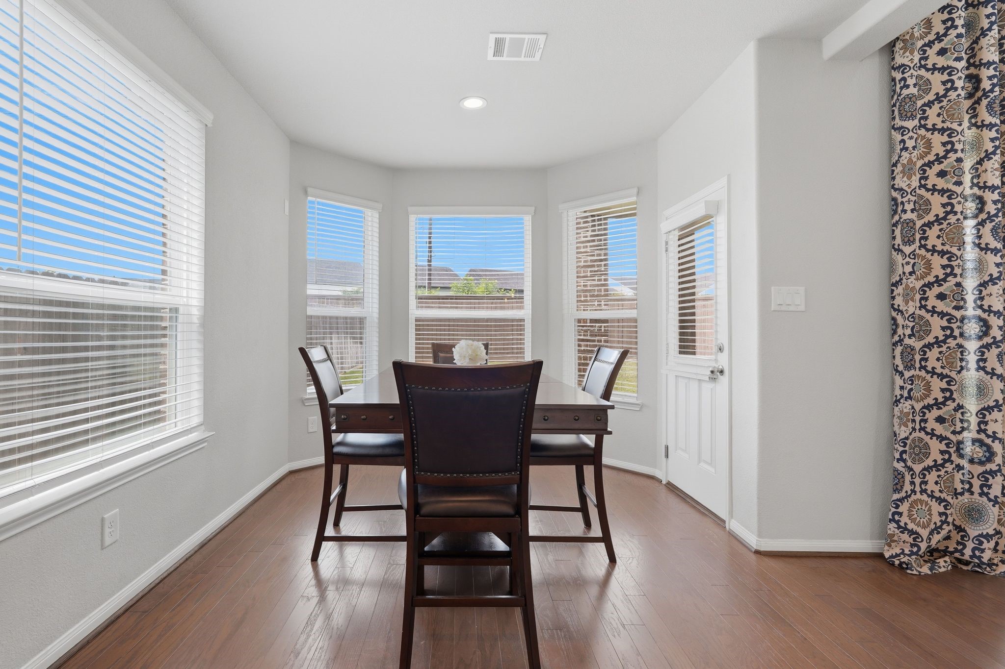 7522 Windsor View Drive Spring, TX 77379 - Photo 16 of 49 Dining area surrounded by windows and backyard views.