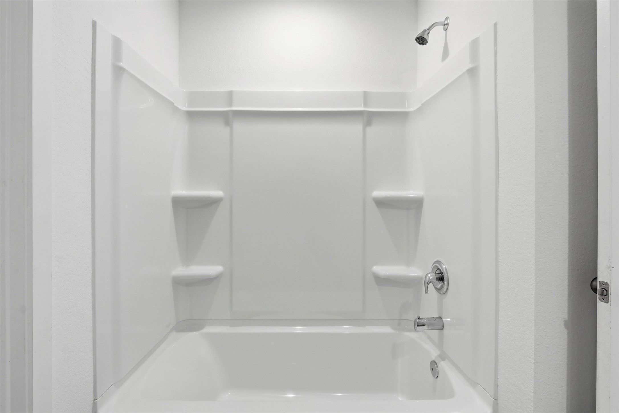 21006 Longwitton Lane Humble, TX 77338 - Photo 22 of 25 a bathroom with a bathtub