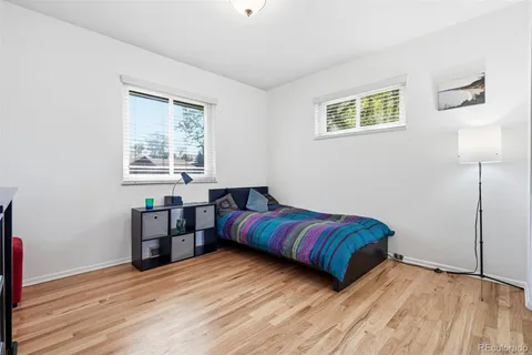 a room with a bed and a window