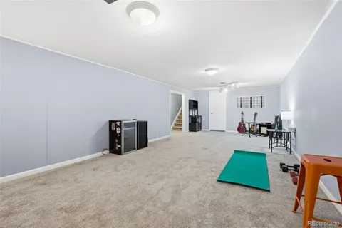 a living room with furniture and a table
