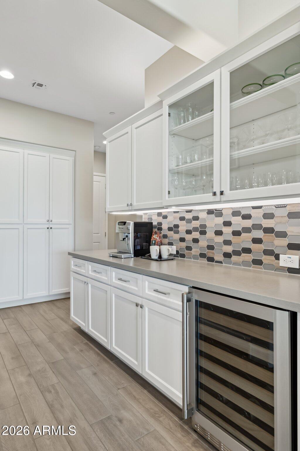 17964 East Wolf Tree Lane Rio Verde, AZ 85263 - Photo 17 of 101 a kitchen with stainless steel appliances granite countertop a sink and a stove