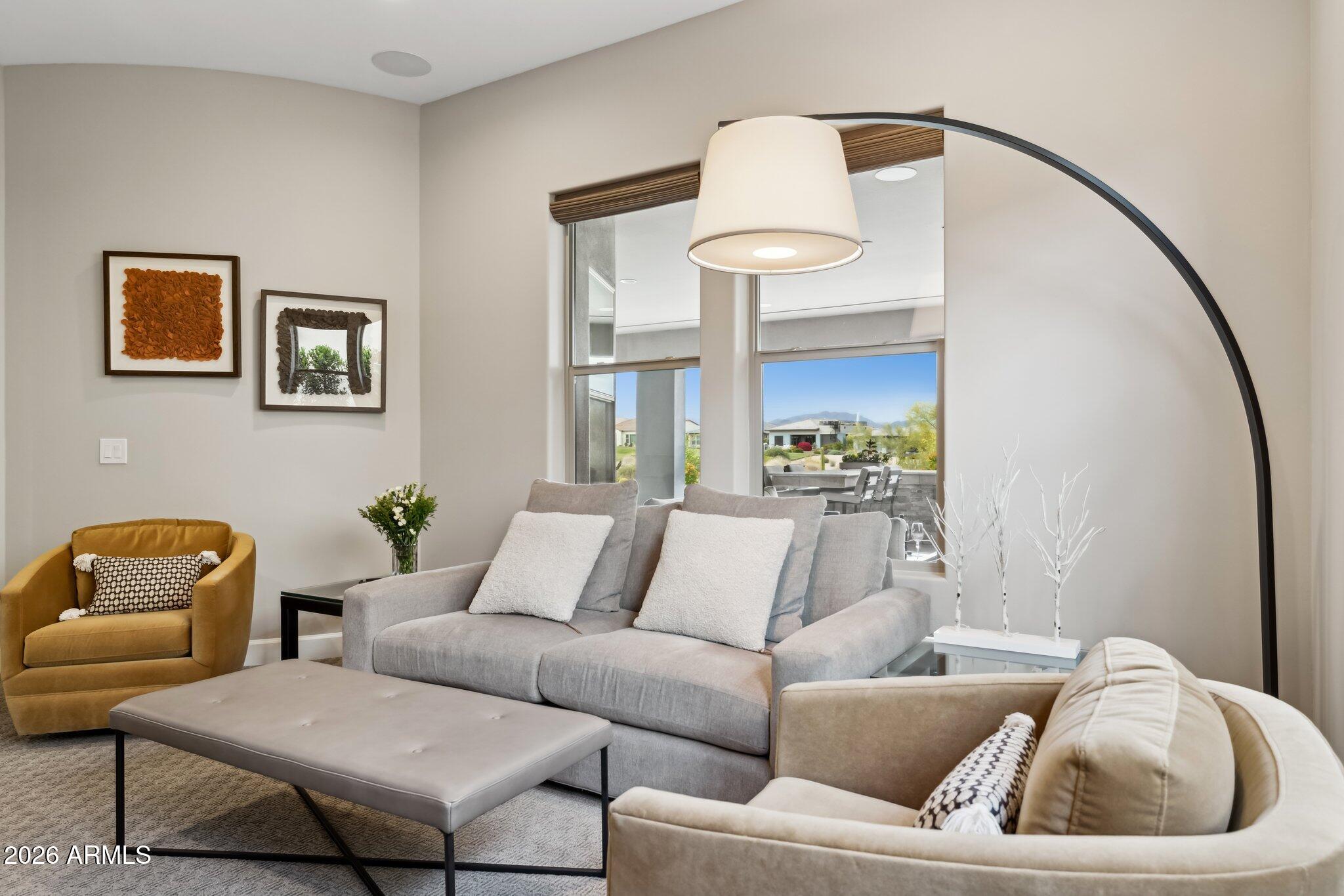 17964 East Wolf Tree Lane Rio Verde, AZ 85263 - Photo 21 of 101 a living room with furniture