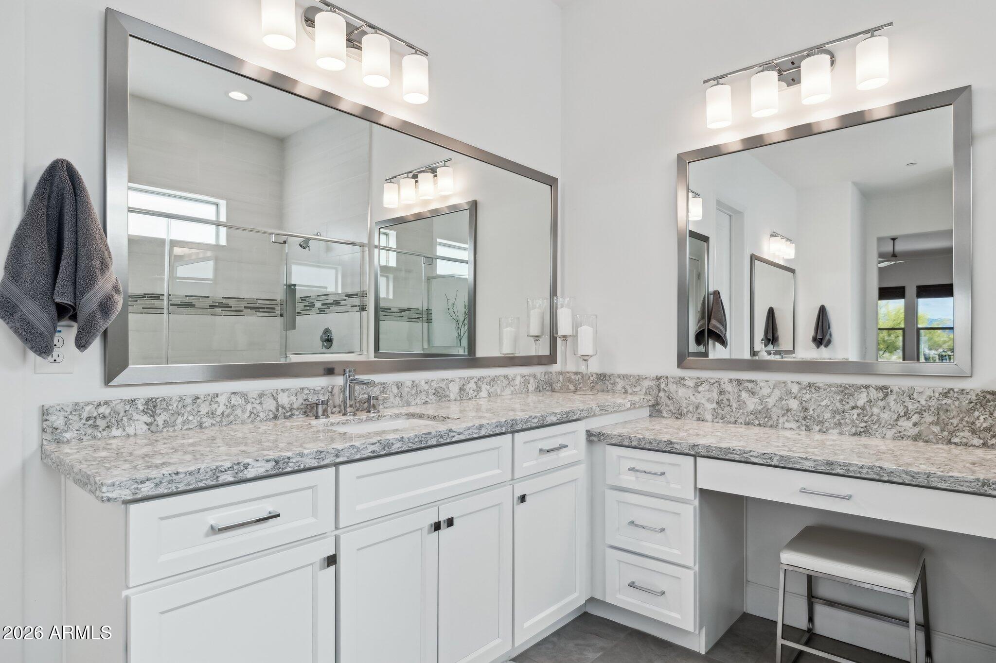 17964 East Wolf Tree Lane Rio Verde, AZ 85263 - Photo 27 of 101 a bathroom with a sink double vanity granite and a mirror