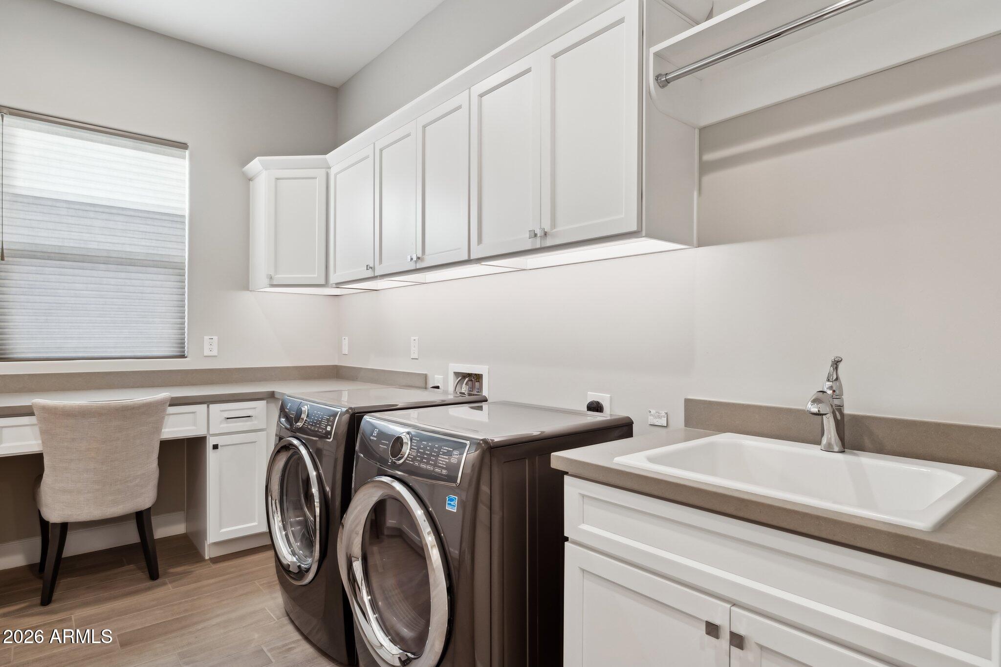 17964 East Wolf Tree Lane Rio Verde, AZ 85263 - Photo 44 of 101 a utility room with dryer and washer