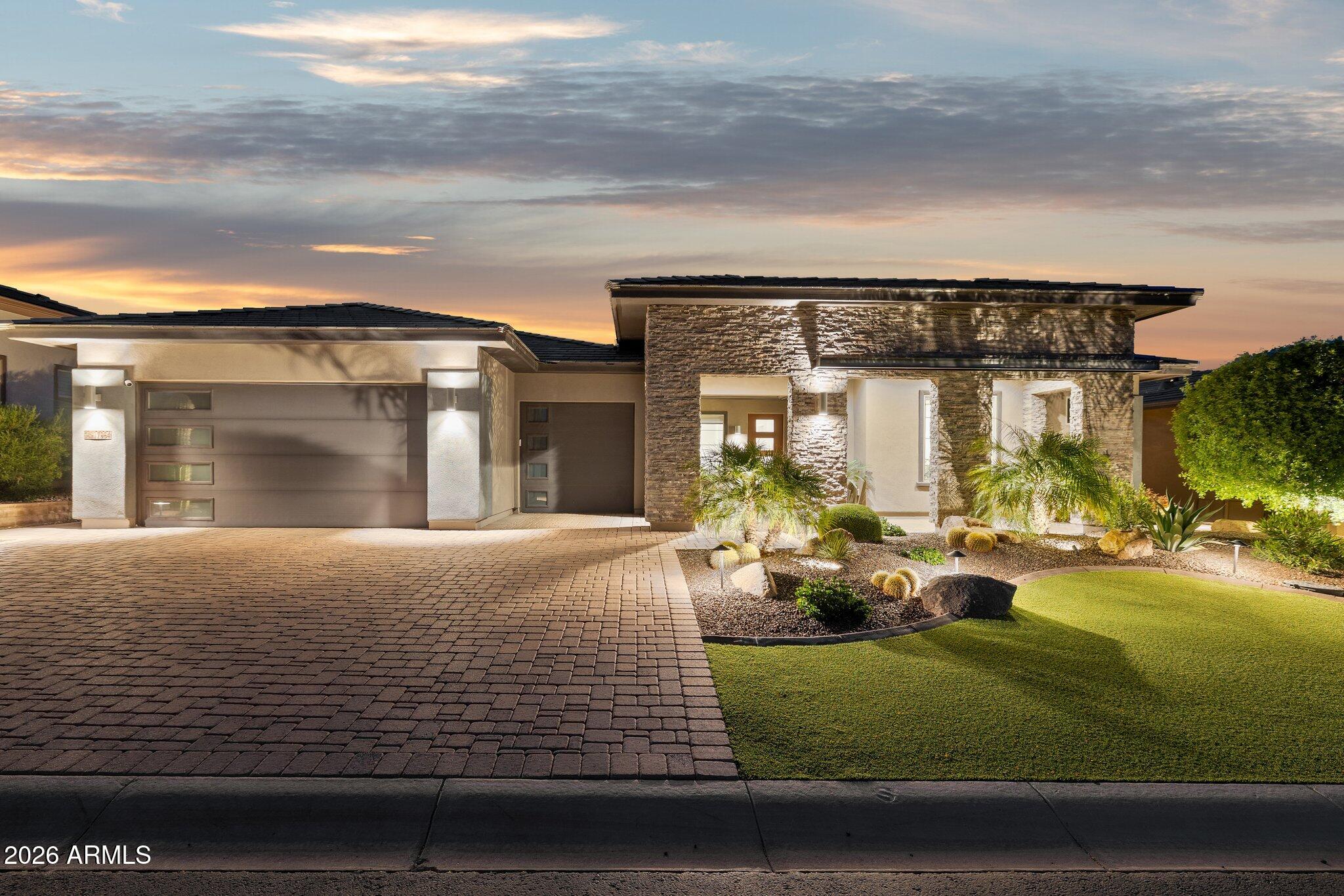 17964 East Wolf Tree Lane Rio Verde, AZ 85263 - Photo 65 of 101 a view of a house with backyard porch and sitting area